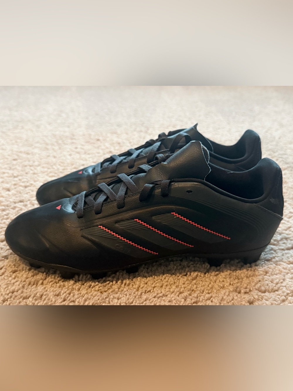 adidas Men's Black Soccer Cleats with Red Stripe Details